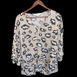 Raw Edge vneck cheetah print sweater with front knot size medium
